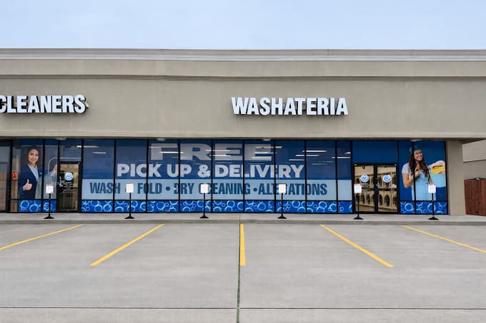 Fry Washateria, Alterations & Cleaners storefront with free pickup & delivery signage, in Katy, TX